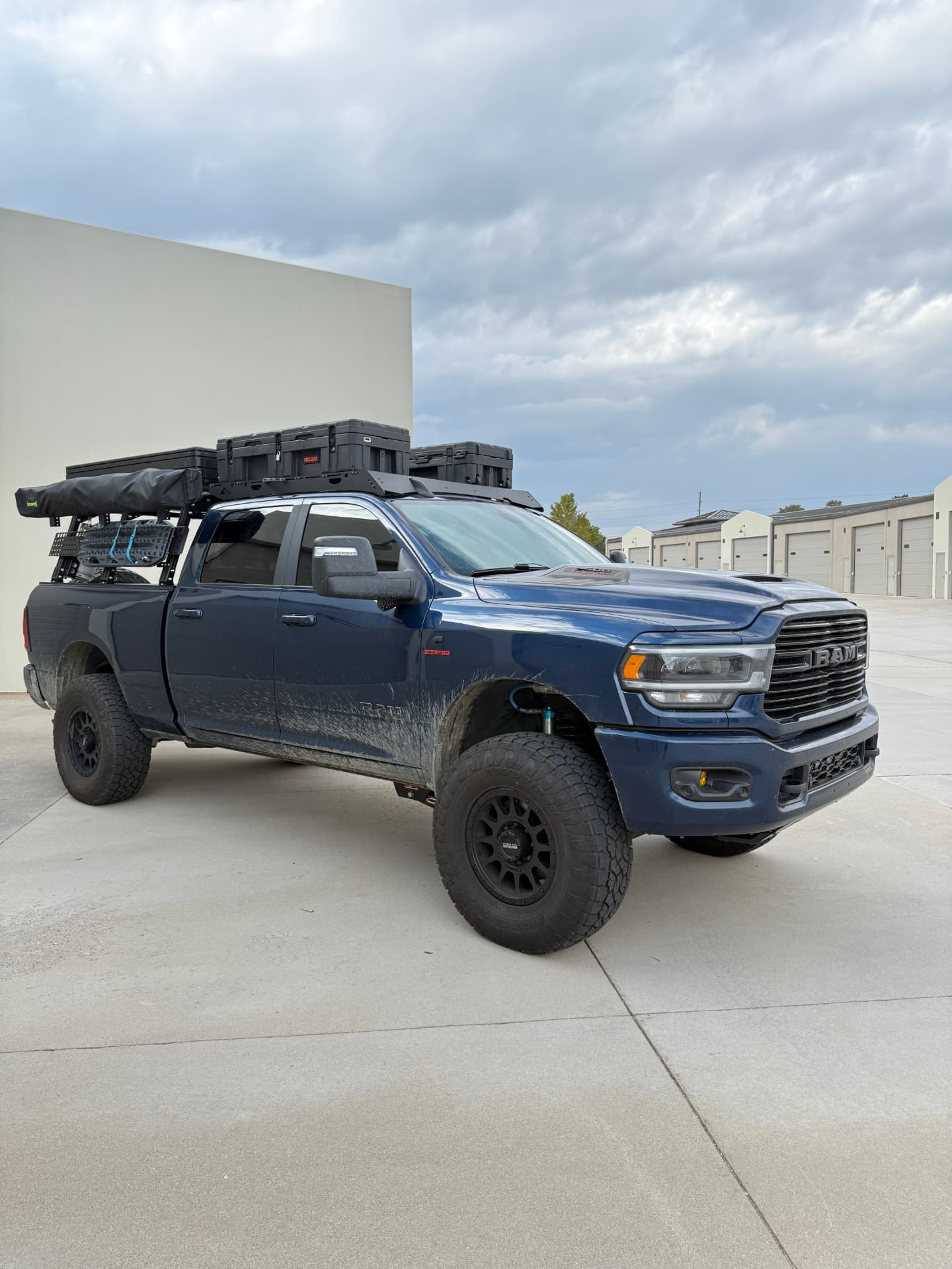 Blue Ram 2500 overland build with ceramic window tint outside the shop