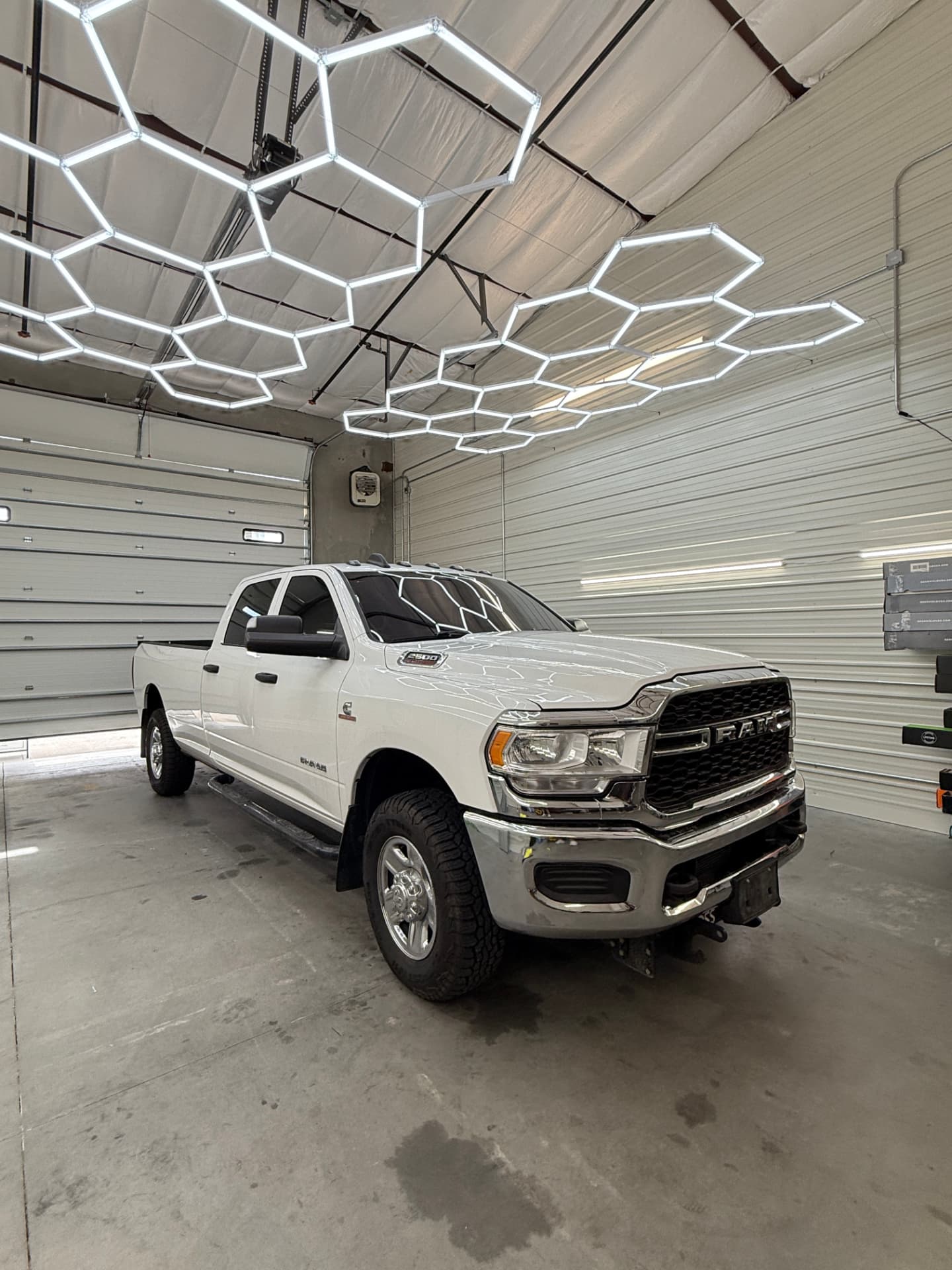 White Ram 2500 Cummins with ceramic window tint in the install bay