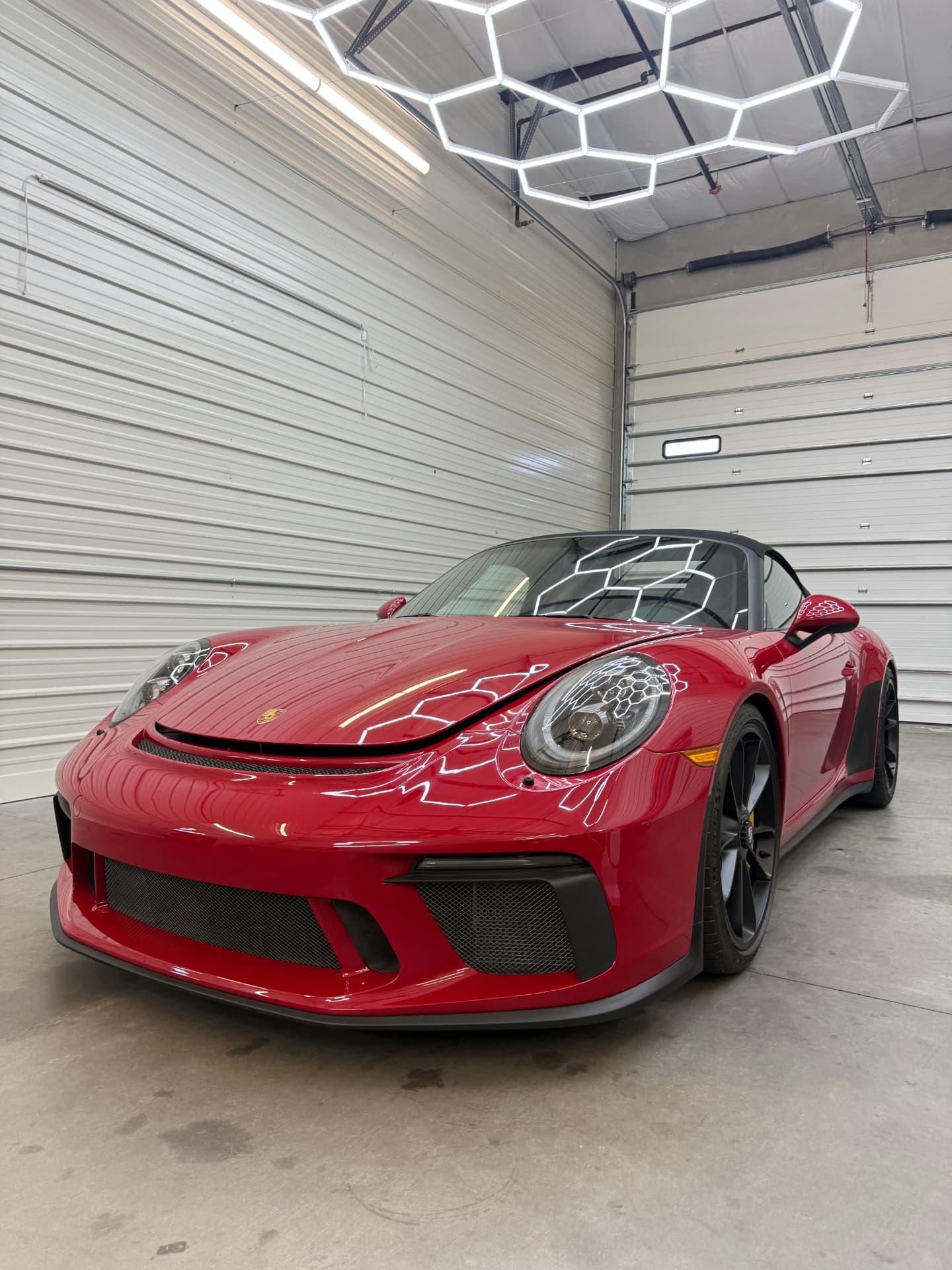 Red Porsche 911 Speedster with ceramic windshield film in the Hypershade bay