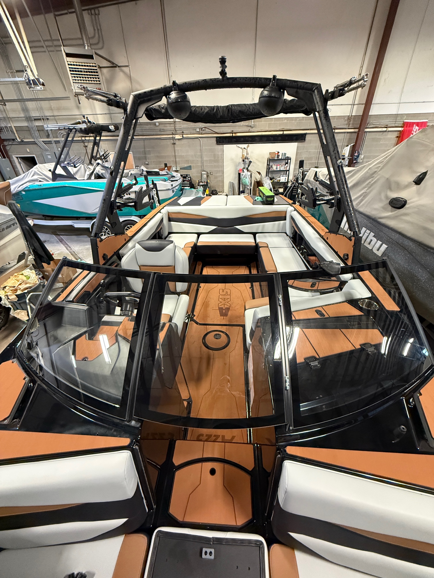 Completed boat windshield tint — front view showing all panels