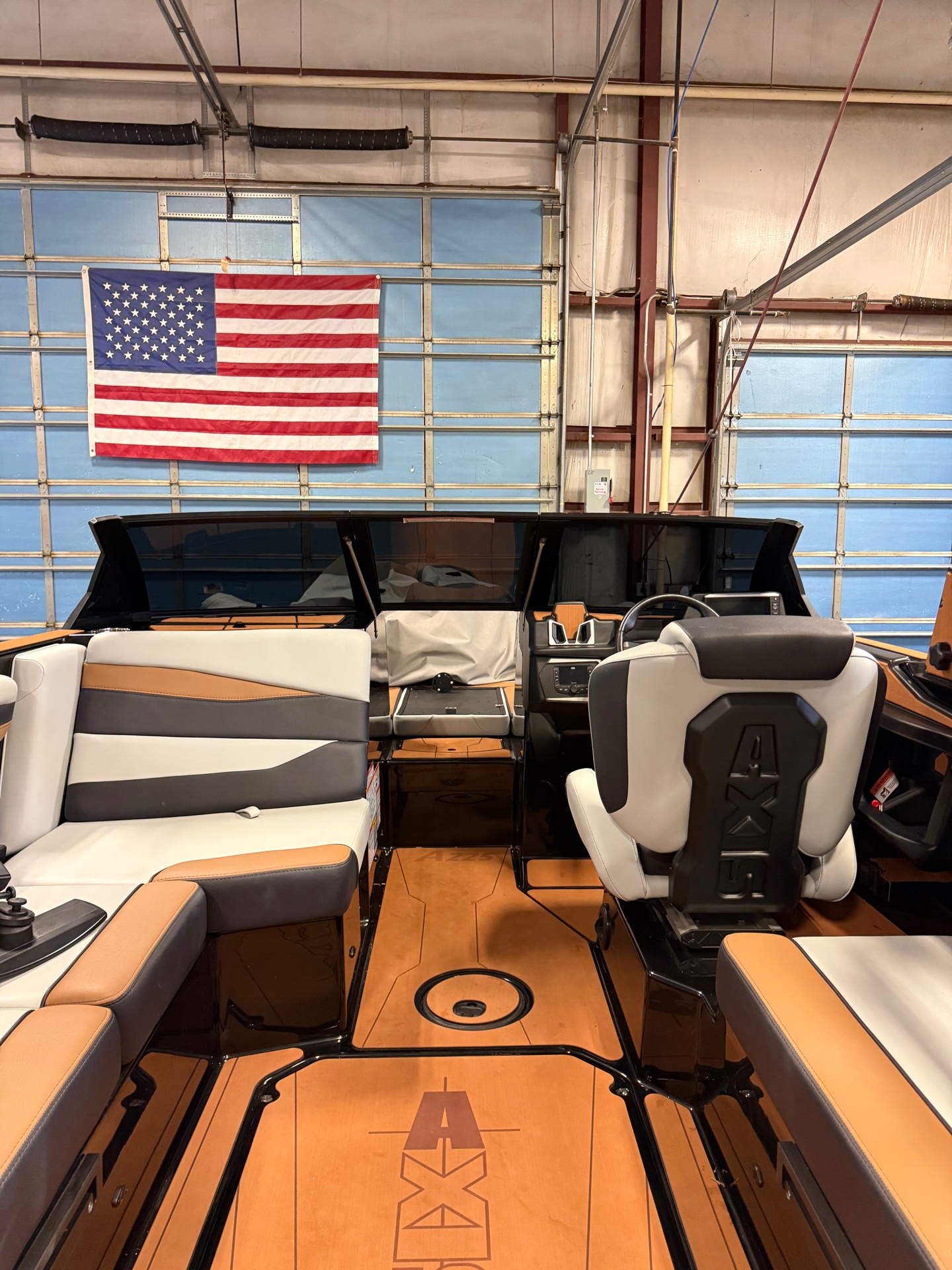 Marine-grade ceramic film applied to boat windshield — cockpit view